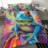 An airbrush cartoon of a blue green frog with rainbow bedding set