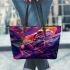 An artistic illustration of a frog in vibrant colors leaather tote bag