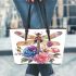 Beautiful dragonfly sitting on top of flowers leather tote bag