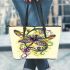 Beautiful dragonfly swirling colors leather tote bag