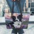 Black and white border collie in the foreground leather tote bag