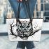 Black and white owl with bright teal eyes leather tote bag