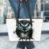 Black and white owl with bright teal eyes leather tote bag