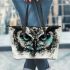 Black and white owl with turquoise highlights leather tote bag