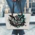 Black and white owl with turquoise highlights leather tote bag