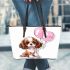 Brown and white king charles spaniel puppy with pink balloons leather tote bag