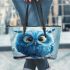 Cartoon blue owl with big eyes leather tote bag