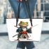 Cartoon frog character dressed as a samurai holding leaather tote bag