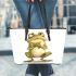 Cartoon frog standing on its hind legs leaather tote bag