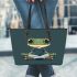 Cartoon frog with big eyes wearing white and brown shoes leaather tote bag