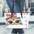 Cartoon owl with a pink bow on its head leather tote bag