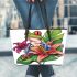 Colorful cartoon tree frog with lily flower leaather tote bag