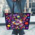 Colorful cute cartoon dog with bow leather tote bag