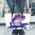 Crown on top of purple and blue tree frog cartoon caricature leaather tote bag