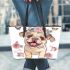 Cute baby english bulldog dog wearing a flower crown and butterfly leather tote bag