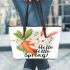 Cute bunny sitting on top of an carrot hello spring leather tote bag