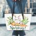 Cute bunny sitting on top of an carrot hello spring leather tote bag