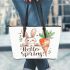 Cute bunny sitting on top of an carrot hello spring leather tote bag