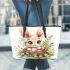 Cute cartoon baby bunny with big eyes sitting leather tote bag