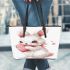 Cute cartoon bunny with a pink bow holding a heart leather tote bag