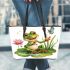 Cute cartoon frog sitting on a lily pad smiling with his legs crossed leaather tote bag