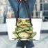 Cute cartoon frog with its front legs crossed leaather tote bag