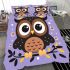 Cute cartoon owl sitting on a branch bedding set