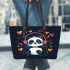 Cute cartoon panda listening to music on headphones leather tote bag