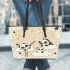 Cute cartoon pandas playing on clouds leather tote bag