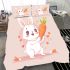 Cute cartoon rabbit is playing with an orange carrot bedding set