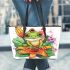 Cute cartoon tree frog with lily flower leaather tote bag