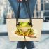 Cute chibi frog sitting on a pencil leaather tote bag