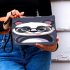 Cute chibi panda wearing glasses makeup bag