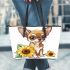 Cute chihuahua puppy with big eyes sitting next to sunflower leather tote bag