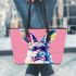 Cute colorful easter bunny with a bow tie and sunglasses leather tote bag