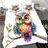 Cute colorful owl with big eyes sitting on a tree branch bedding set