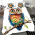 Cute colorful owl with big eyes sitting on a tree branch bedding set