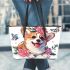 Cute corgi puppy with pink roses and butterflies leather tote bag