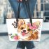 Cute corgi puppy with pink roses in her hair and butterflies leather tote bag