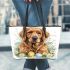 Cute golden retriever with easter eggs and white daisies leather tote bag