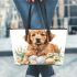 Cute golden retriever with easter eggs and white daisies leather tote bag