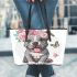 Cute grey pitbull puppy with a pink flower crown on its head leather tote bag