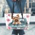 Cute happy yorkshire terrier old truck flowers and hearts leather tote bag