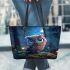 Cute owl cartoon with big blue eyes night scene with moon leather tote bag