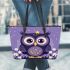 Cute owl cartoon with big eyes and yellow stars on its head leather tote bag