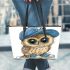 Cute owl wearing a blue cap and shoes leather tote bag