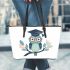 Cute owl wearing glasses and a graduation hat leather tote bag