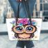 Cute owl with flowers on its head leather tote bag