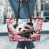 Cute panda surrounded among blooming cherry blossoms leather tote bag