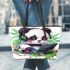 Cute panda wearing headphones and playing computer leather tote bag